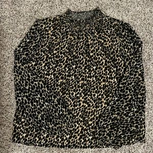 J Crew size large. Leopard print top. Wont once. Like new.
